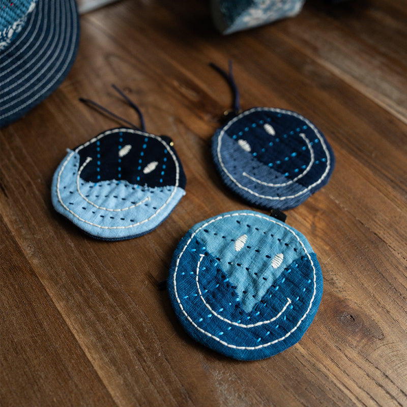 Handmade embroidered indigo fabric smiley coin purse