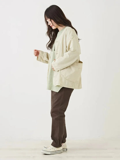 Japanese-style workwear with color blocking and large pockets, lightweight jacket.