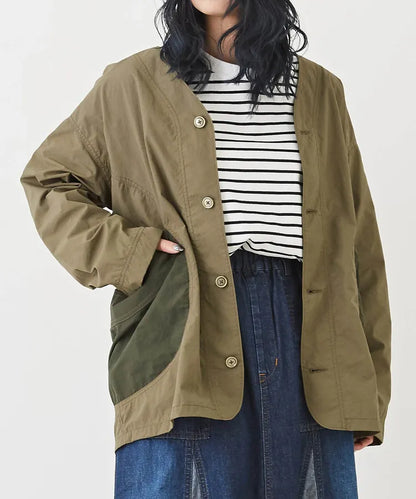 Japanese-style workwear with color blocking and large pockets, lightweight jacket.