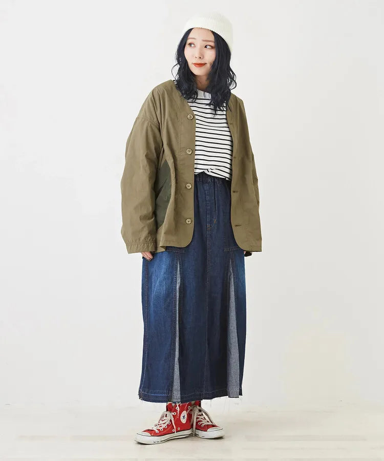 Japanese-style workwear with color blocking and large pockets, lightweight jacket.