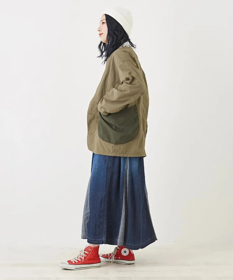 Japanese-style workwear with color blocking and large pockets, lightweight jacket.