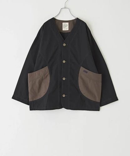 Japanese-style workwear with color blocking and large pockets, lightweight jacket.
