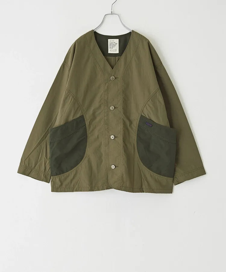 Japanese-style workwear with color blocking and large pockets, lightweight jacket.