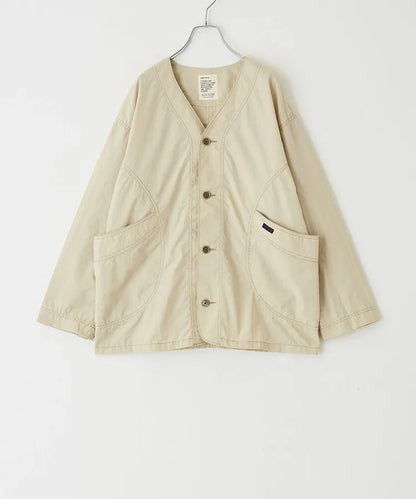 Japanese-style workwear with color blocking and large pockets, lightweight jacket.