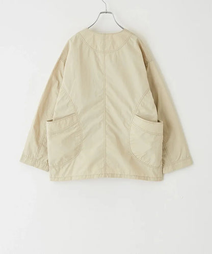 Japanese-style workwear with color blocking and large pockets, lightweight jacket.