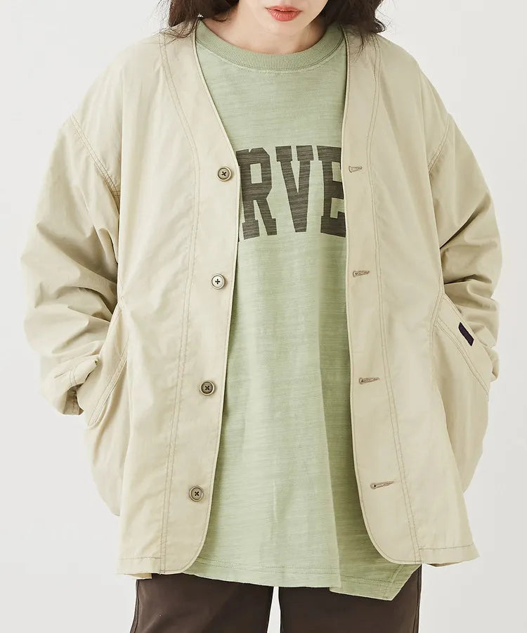Japanese-style workwear with color blocking and large pockets, lightweight jacket.