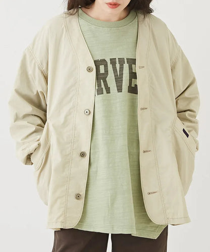Japanese-style workwear with color blocking and large pockets, lightweight jacket.