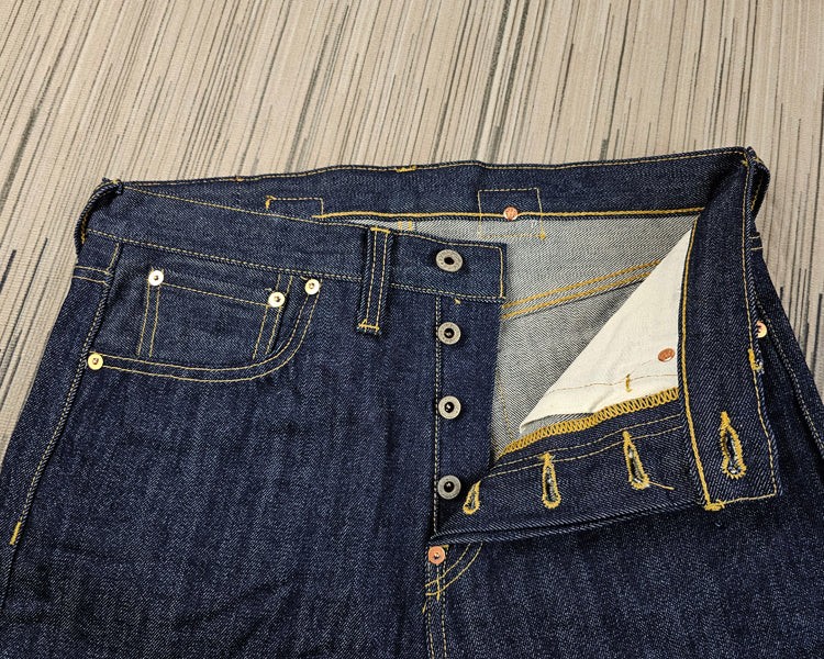 replica red ear air-spun indigo tannins loose high-rise Paris button jeans