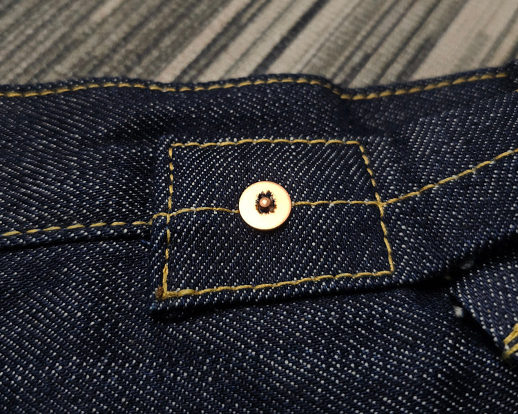 replica red ear air-spun indigo tannins loose high-rise Paris button jeans