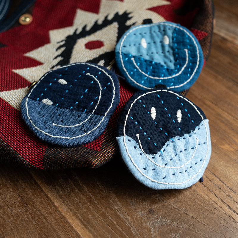 Handmade embroidered indigo fabric smiley coin purse