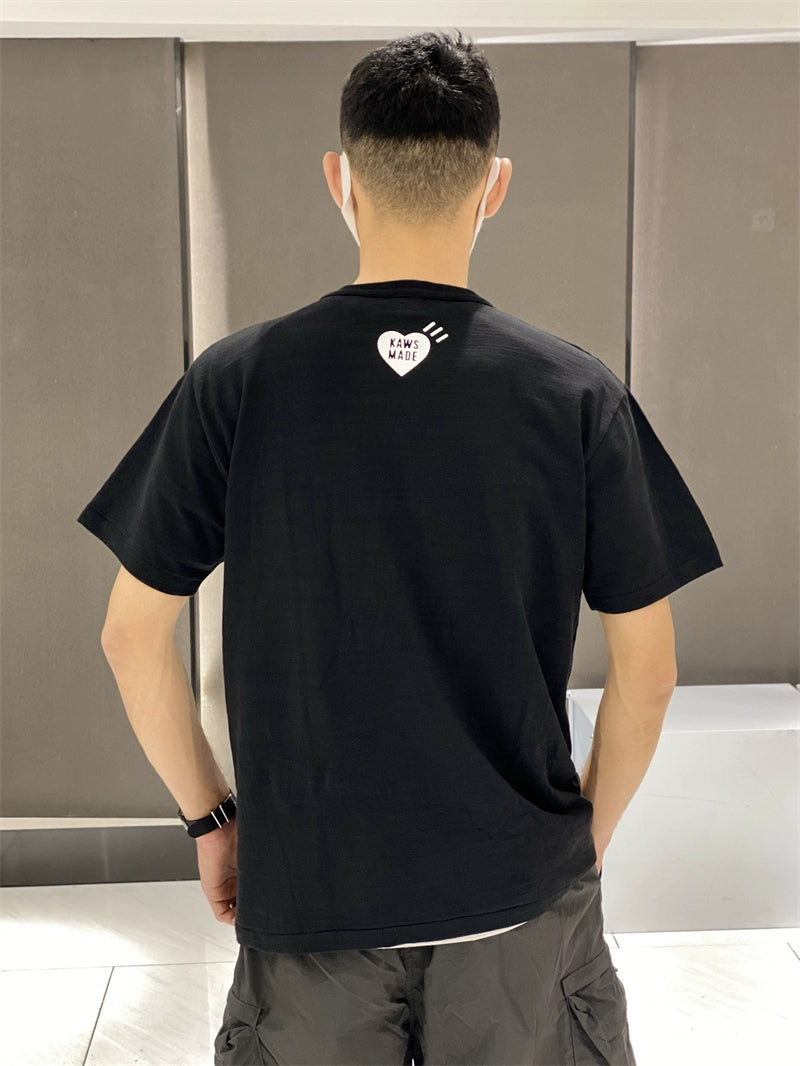 Very good-looking ~ HMAN co-branded KAWS camouflage ape head heart print slub cotton short sleeve T-shirt summer nigo
