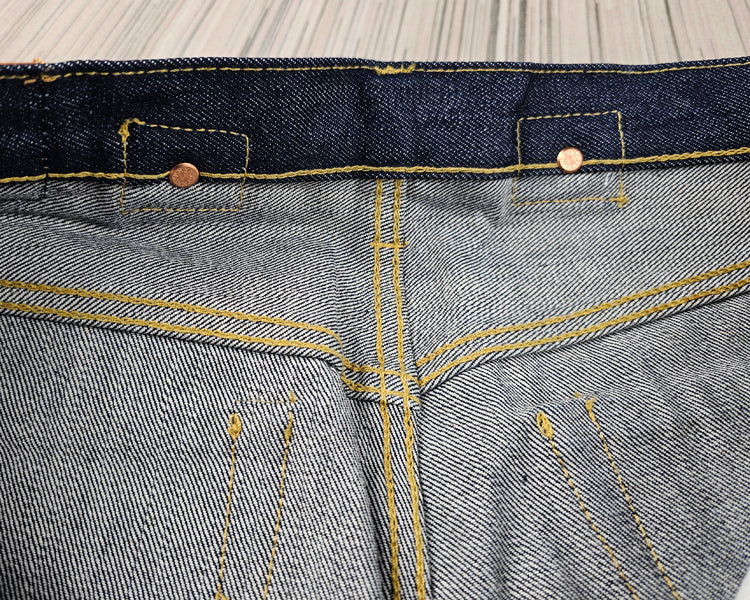 replica red ear air-spun indigo tannins loose high-rise Paris button jeans