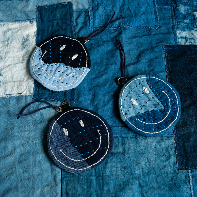 Handmade embroidered indigo fabric smiley coin purse