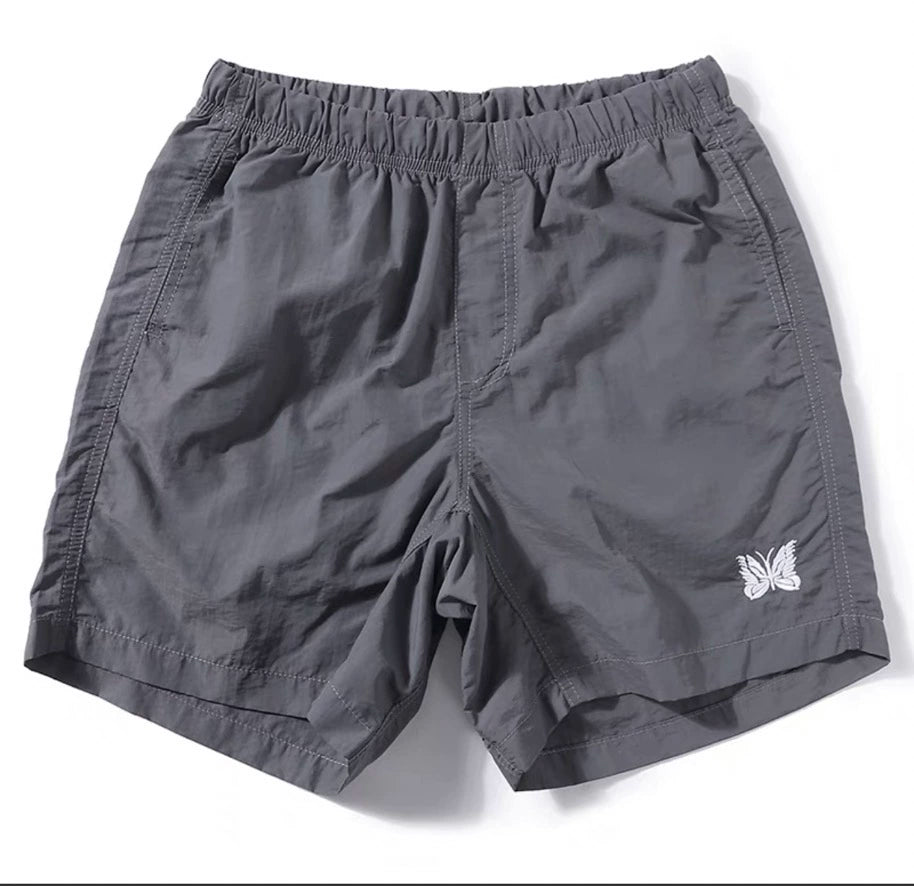 Butterfly embroidery day tide City boy nylon quick-drying beach shorts
